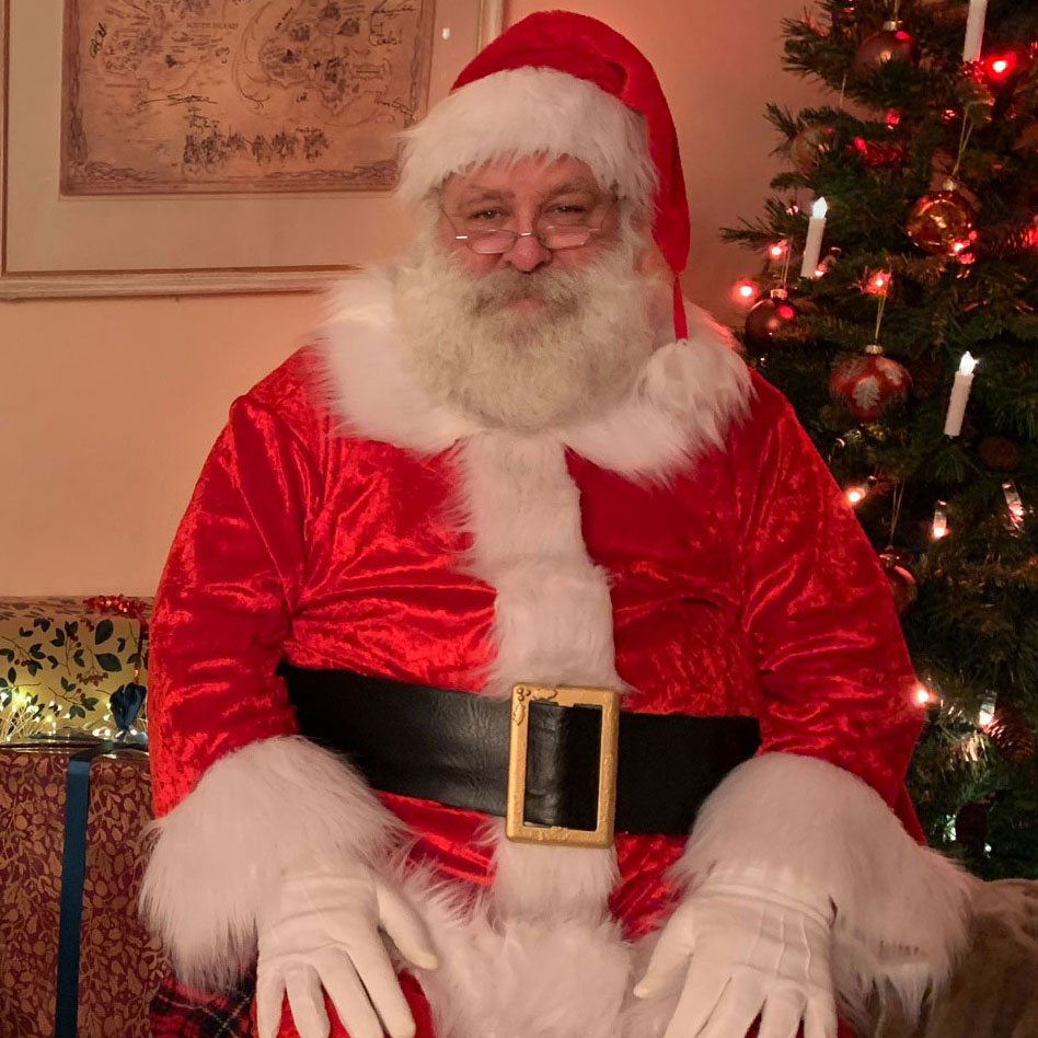 Mr C sitting by his tree!